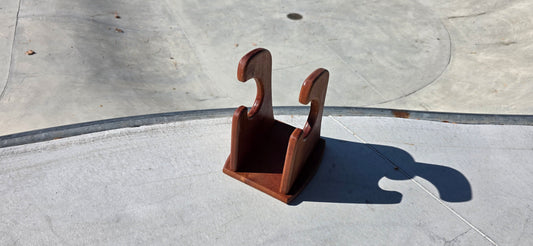 The Wave – Handcrafted Mahogany Skateboard Stand